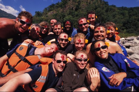 The team on a hike into the river during the 14 day Dashain Festival