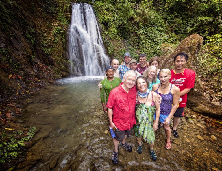 Image of group in front of waterfall on the Karnali river