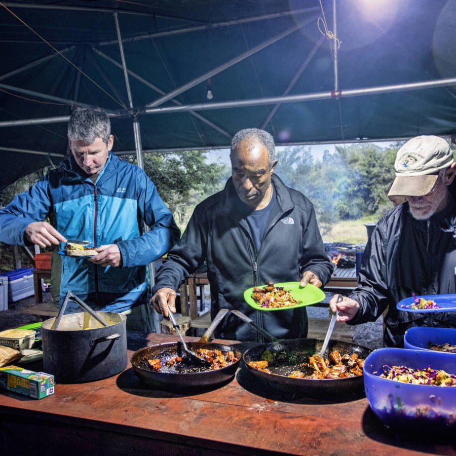 Image of clients serving themselves food on the Landsborough River