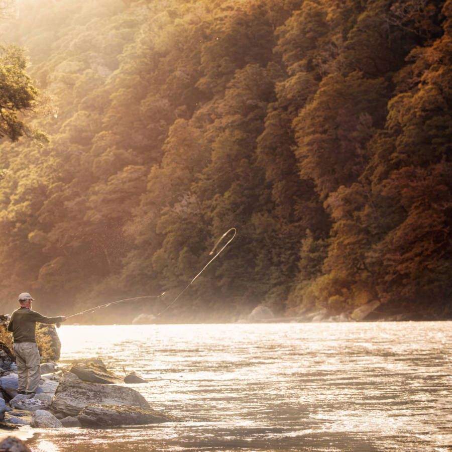 Image of man fly fishing in New Zealand