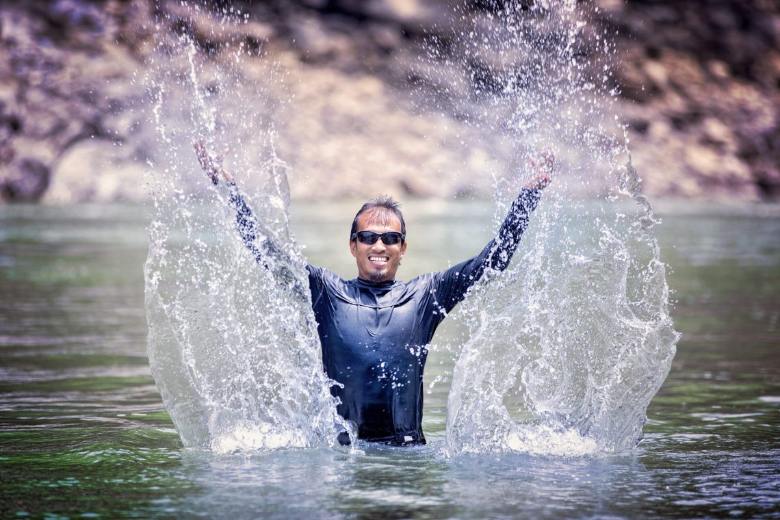Image of Chrish Shrestha rafting guide and safety kayaker