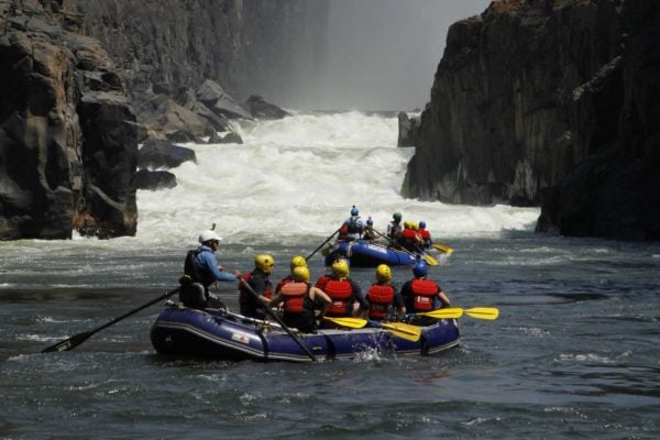 Two rafts below Victoria Falls looking at the Minus rapids