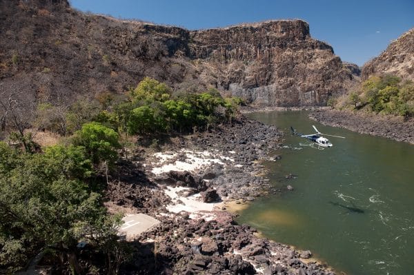 A helicopter leaving the Batoka Gorge on the Zambezi